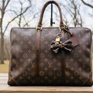 SOLD Authentic LOUIS VUITTON Porte Documan de Voyage  W/ Key &Lock, LV Tag .